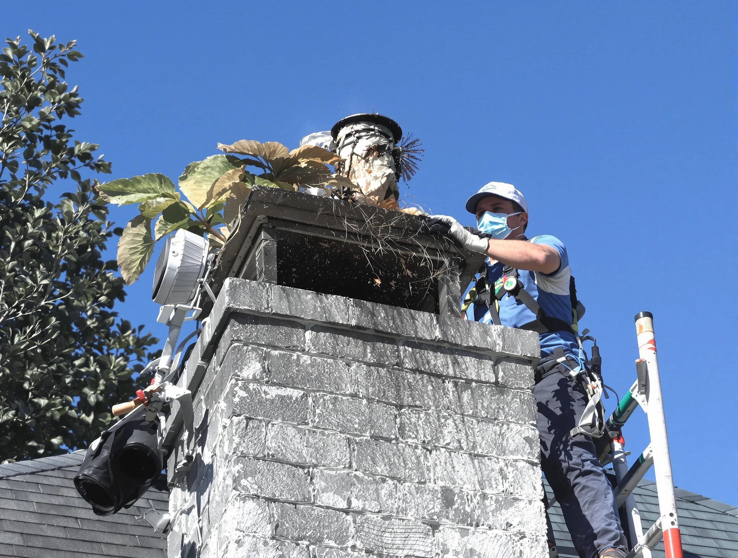 Sayreville Chimney Sweep specialist performing chimney cleaning in Sayreville, NJ