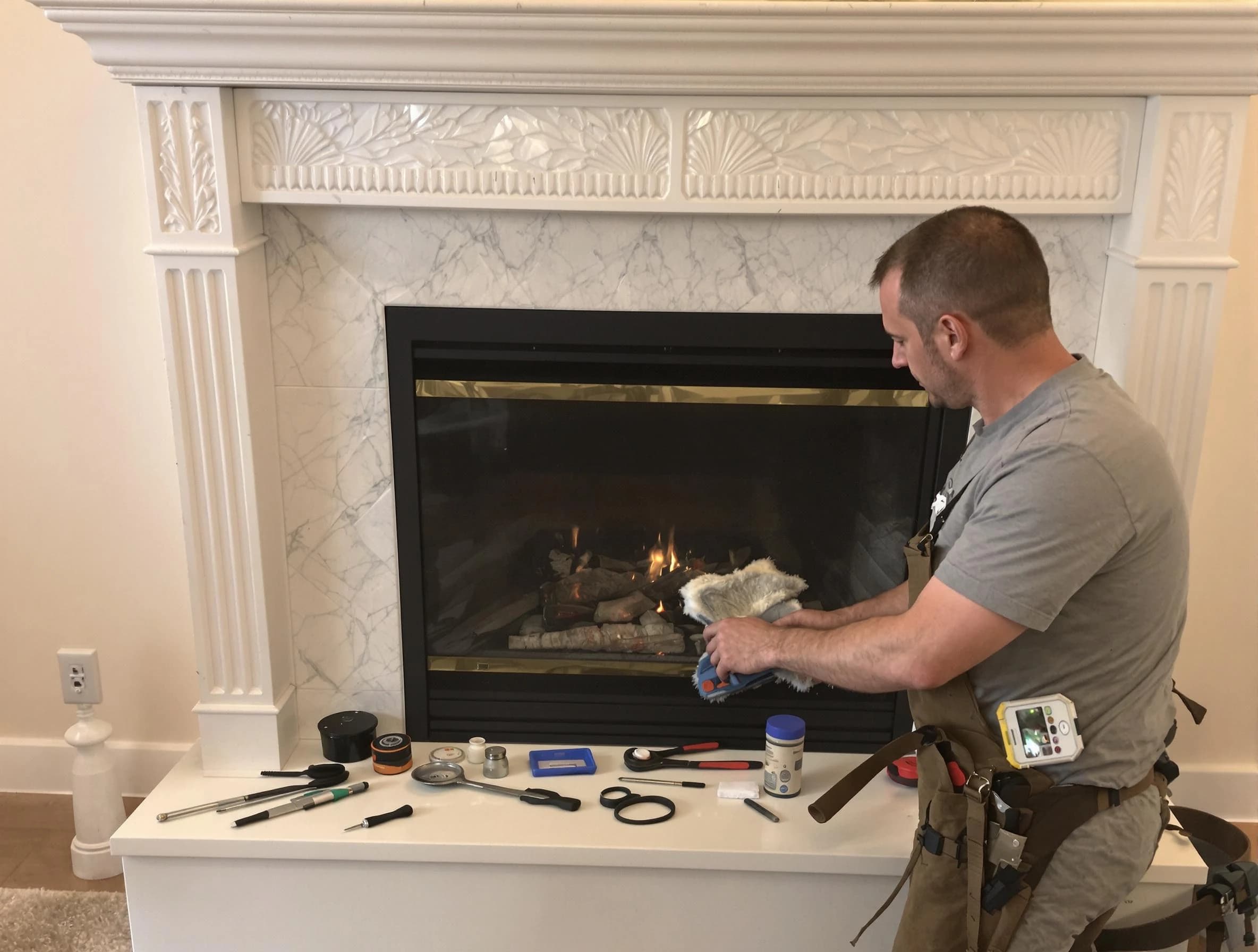 Sayreville Chimney Sweep performing fireplace maintenance in Sayreville, NJ